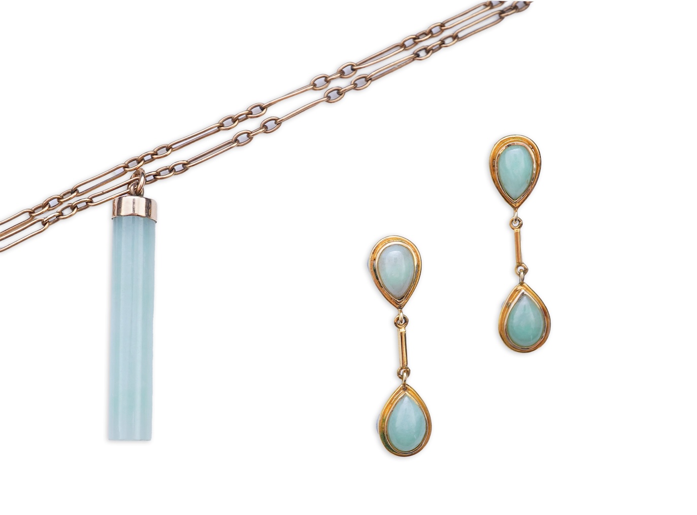 A jadeite pendant and pair of earrings